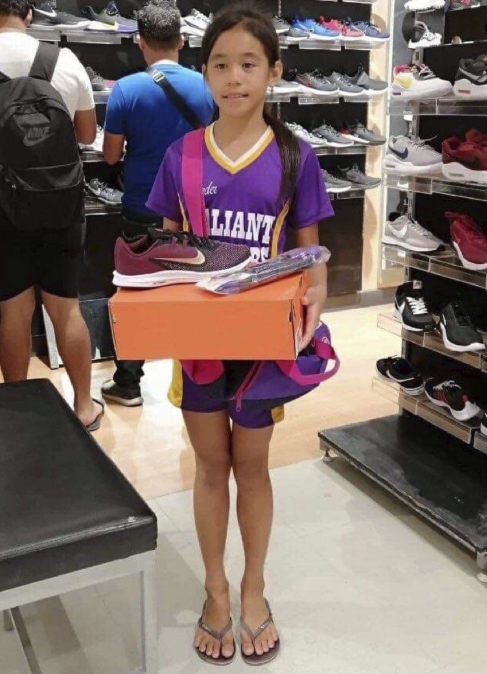 rhea bullos nike suit